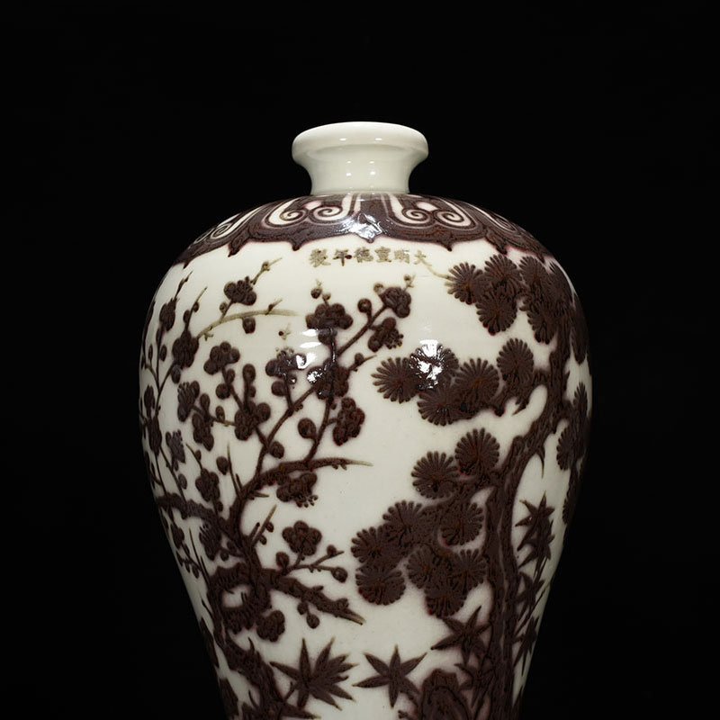 Ming Dynasty Xuande underglaze red pine bamboo and plum vase