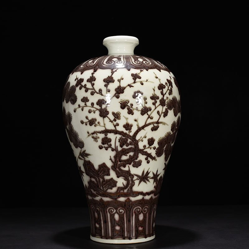 Ming Dynasty Xuande underglaze red pine bamboo and plum vase