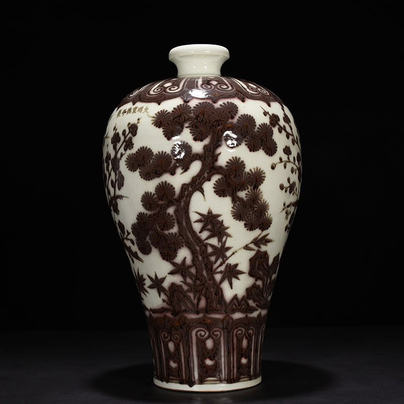 Ming Dynasty Xuande underglaze red pine bamboo and plum vase