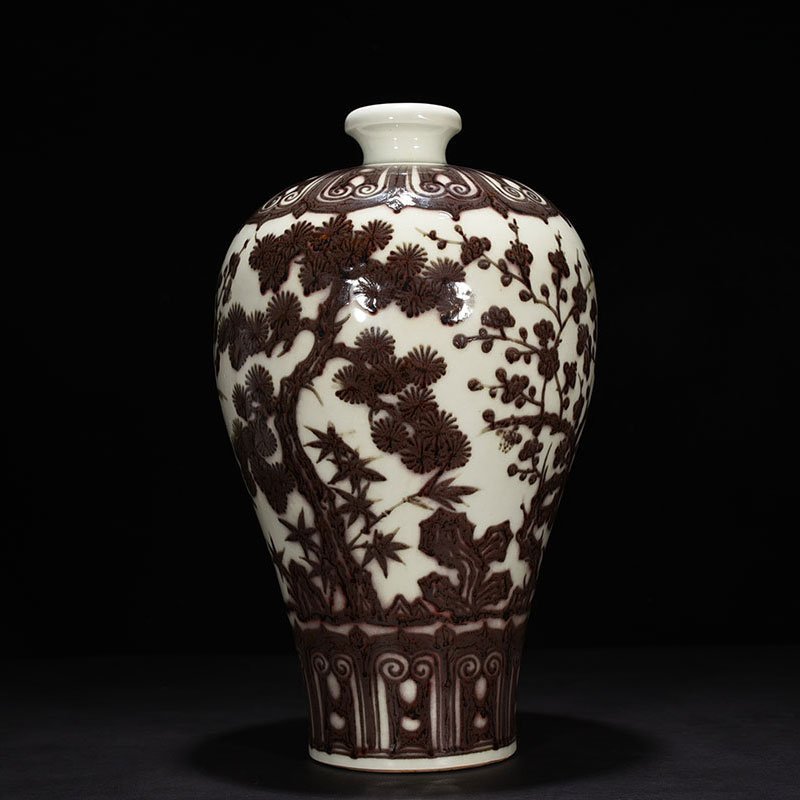 Ming Dynasty Xuande underglaze red pine bamboo and plum vase