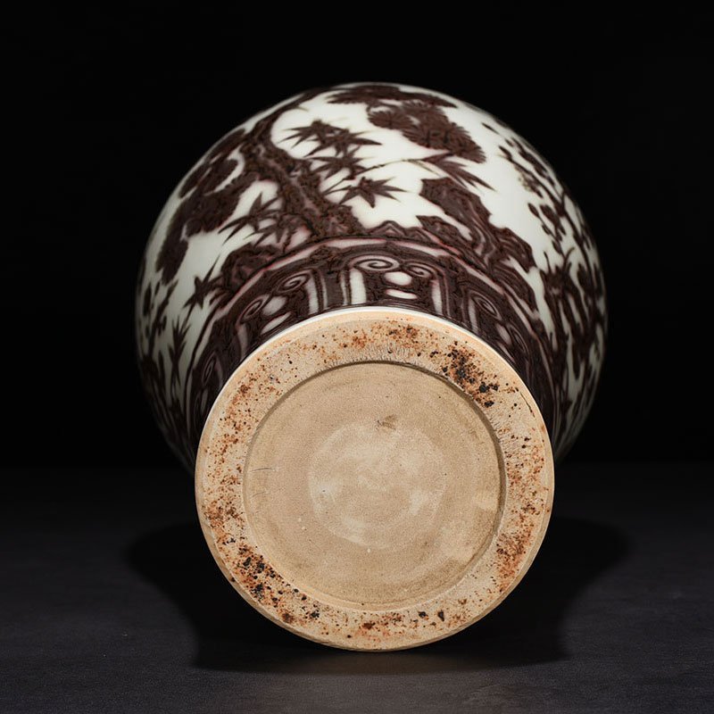 Ming Dynasty Xuande underglaze red pine bamboo and plum vase