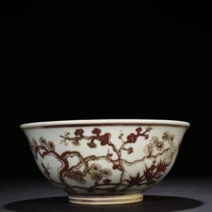 Ming Dynasty Xuande underglaze red pine bamboo and plum pattern bowl