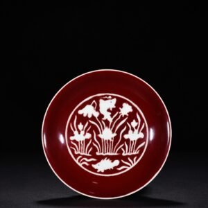 Ming Dynasty Xuande Ji red glaze engraved fish and algae pattern plate