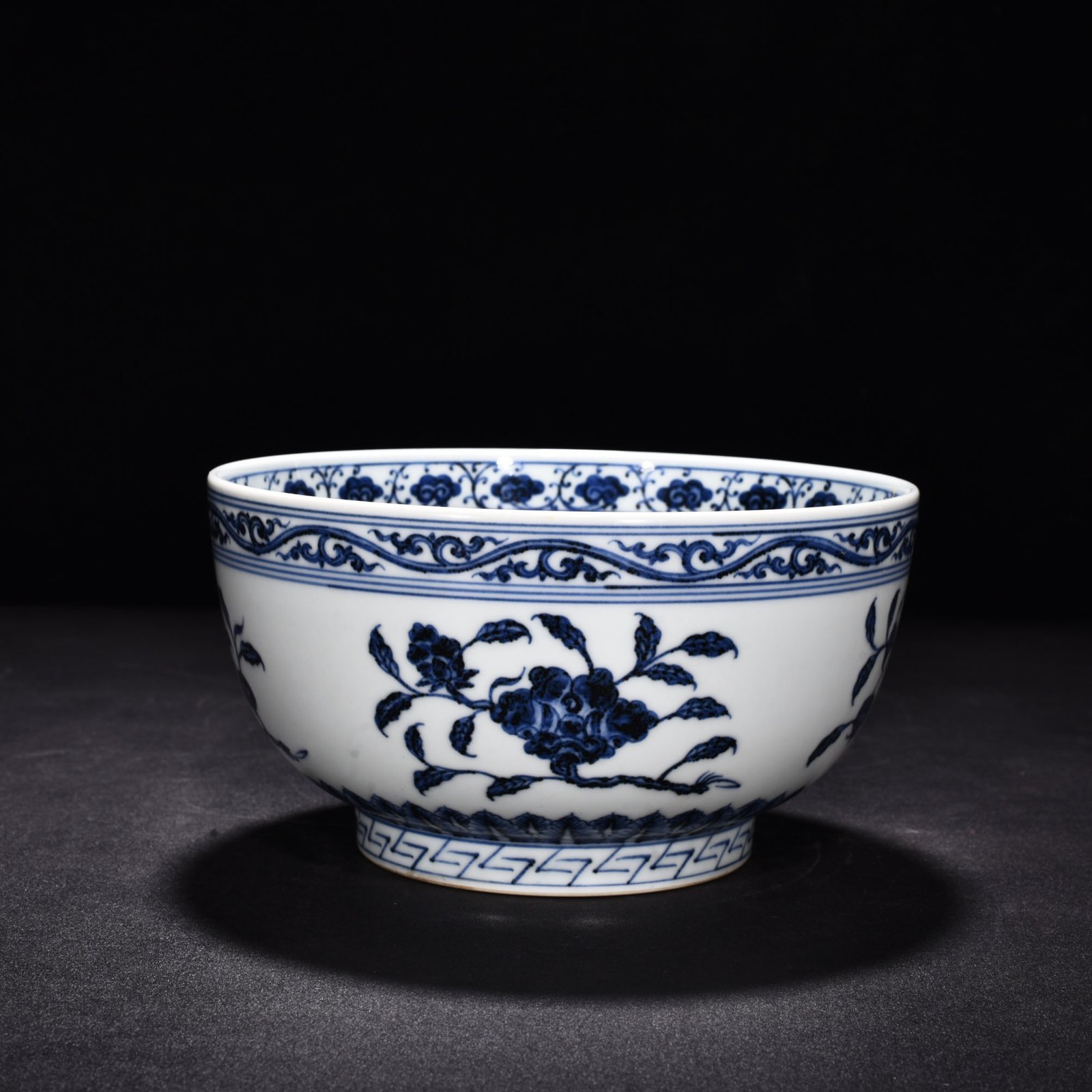 Ming Dynasty Xuande blue and white Arhat bowl with three fruits and flowers