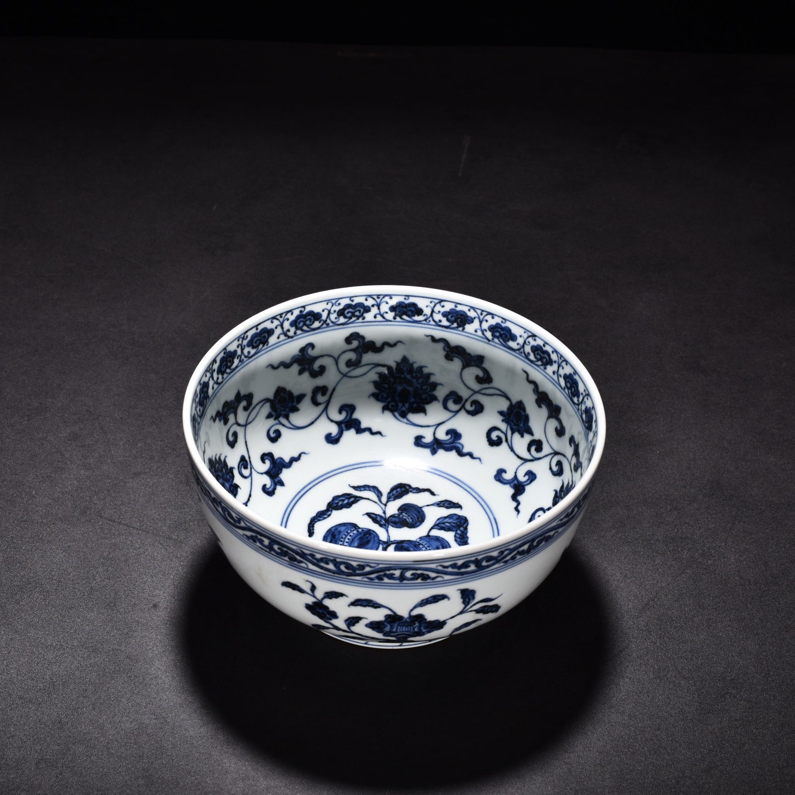 Ming Dynasty Xuande blue and white Arhat bowl with three fruits and flowers