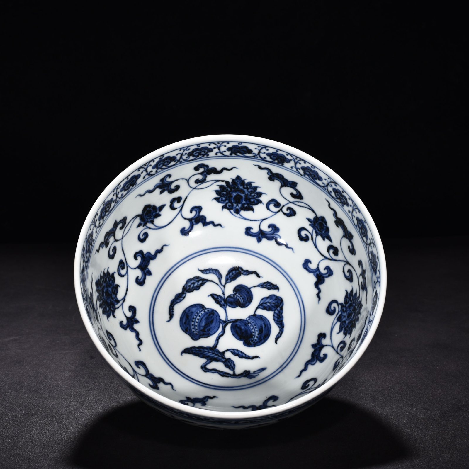 Ming Dynasty Xuande blue and white Arhat bowl with three fruits and flowers