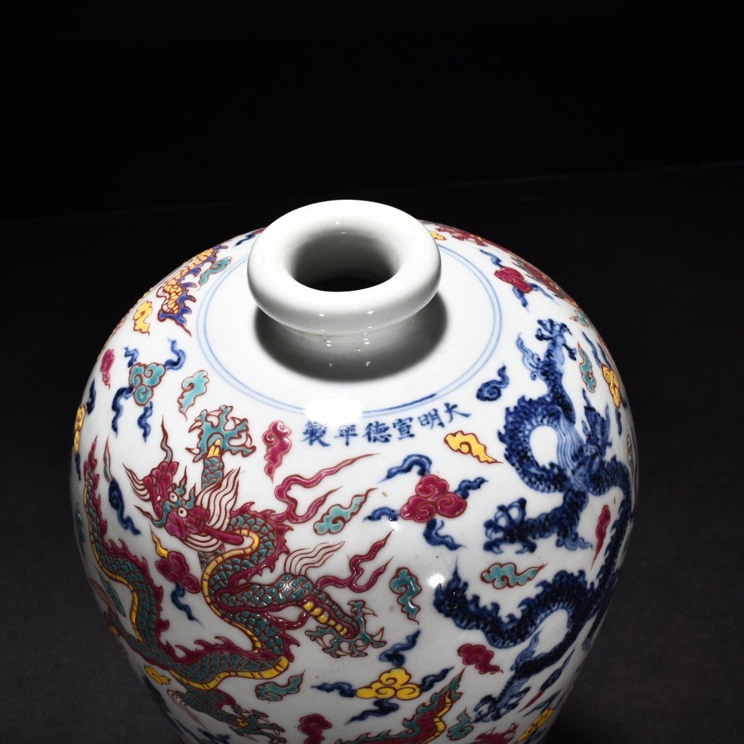 Ming Dynasty Xuande blue and white five-color five-dragon pattern plum vase