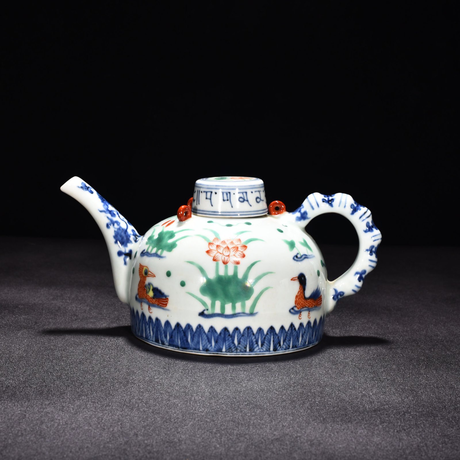 Ming Dynasty Xuande blue and white multi-colored lotus pond bamboo-jointed ewer