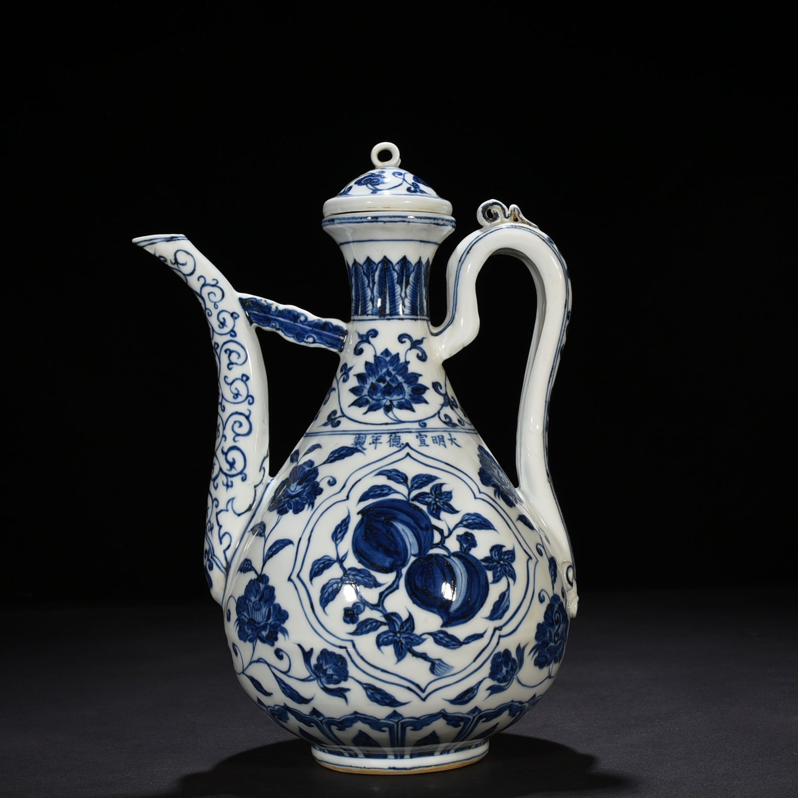 Ming Dynasty Xuande blue and white ewer with broken branches flowers and fruits