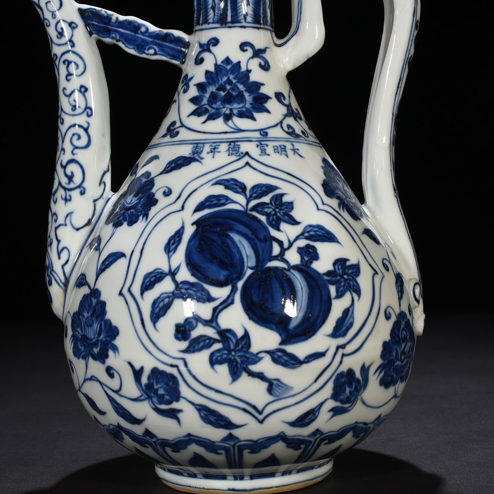 Ming Dynasty Xuande blue and white ewer with broken branches flowers and fruits
