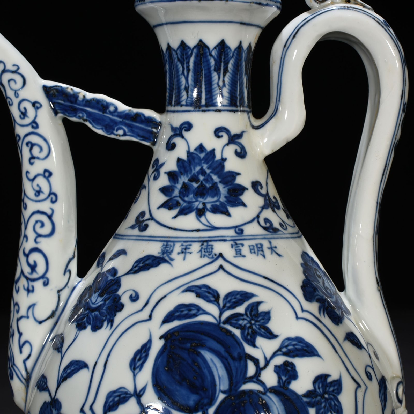 Ming Dynasty Xuande blue and white ewer with broken branches flowers and fruits