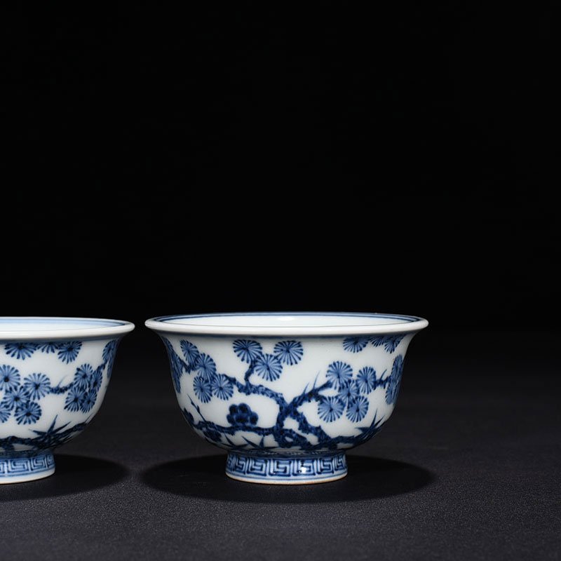 Ming Dynasty Xuande blue and white pine bamboo and plum pattern pressed hand cup