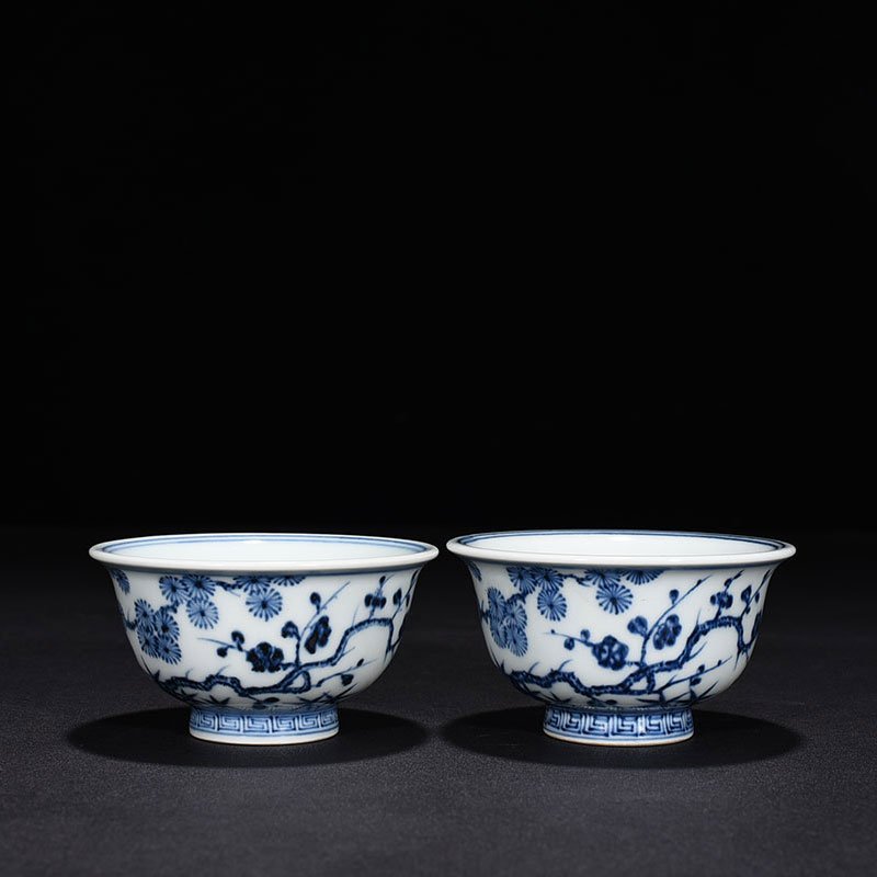 Ming Dynasty Xuande blue and white pine bamboo and plum pattern pressed hand cup