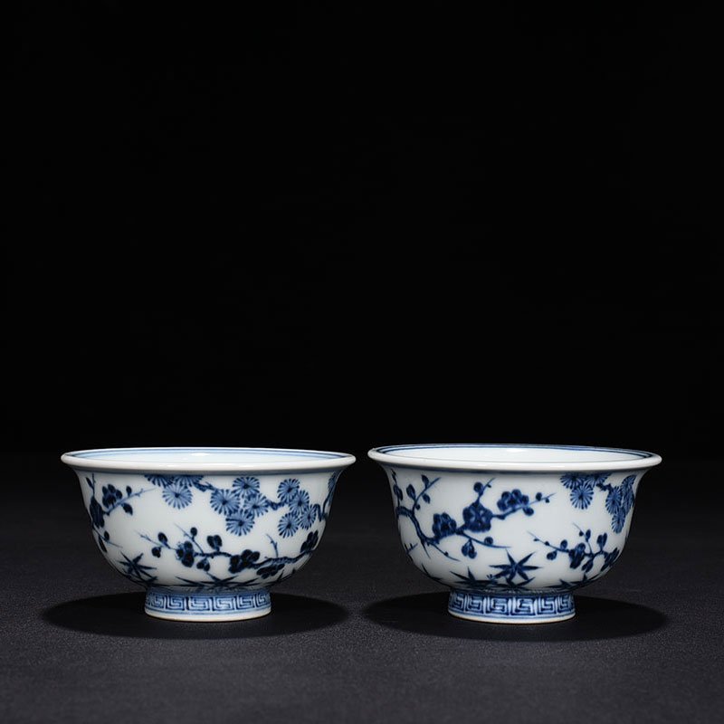 Ming Dynasty Xuande blue and white pine bamboo and plum pattern pressed hand cup