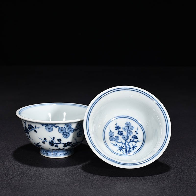 Ming Dynasty Xuande blue and white pine bamboo and plum pattern pressed hand cup