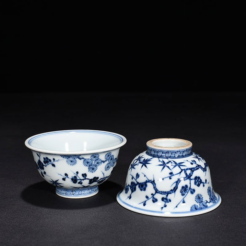 Ming Dynasty Xuande blue and white pine bamboo and plum pattern pressed hand cup