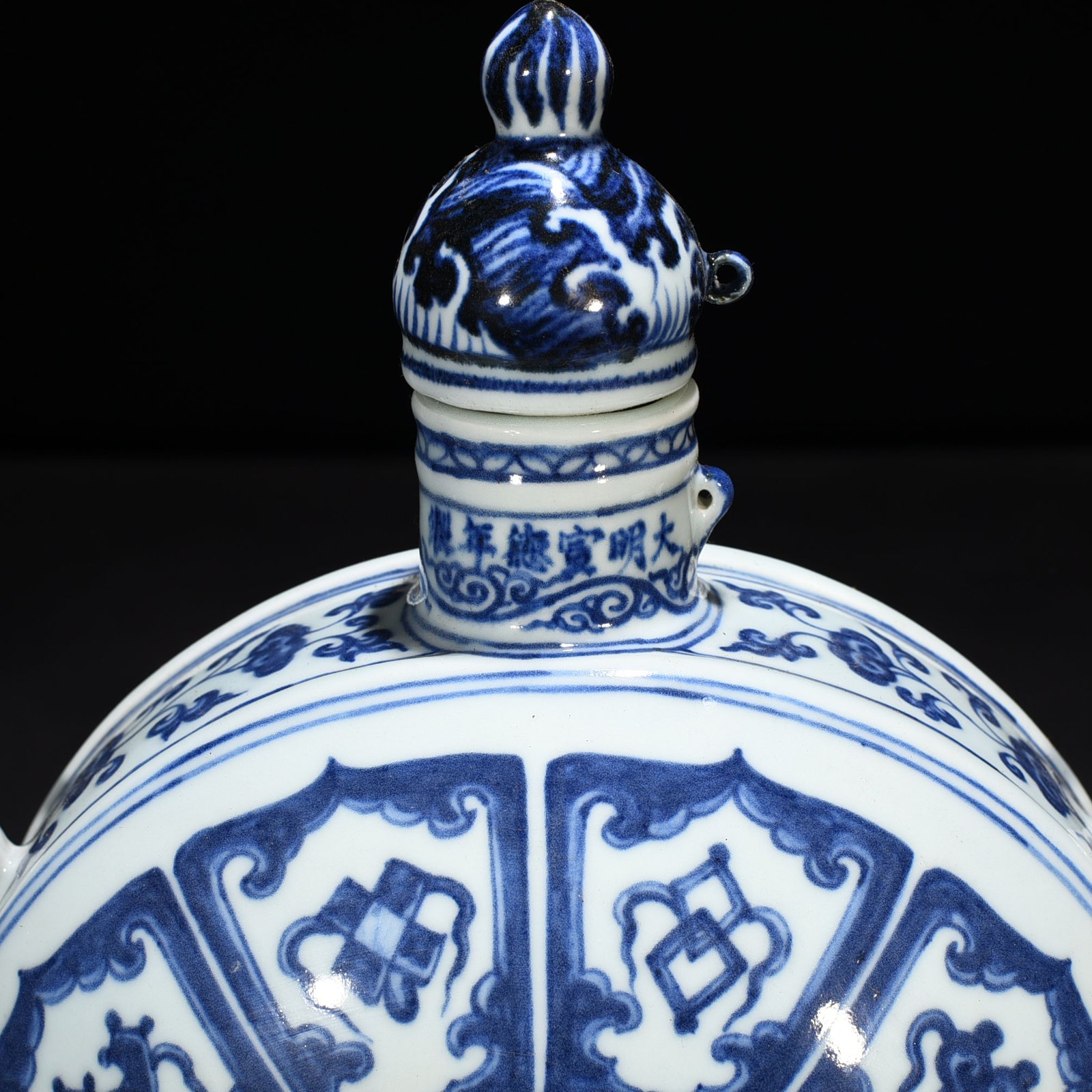 Ming Dynasty Xuande blue and white magic weapon pattern double-series flat vase