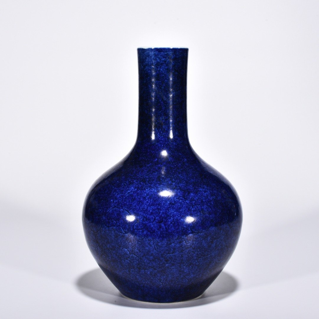 Ming Dynasty Xuande blue-glazed celestial vase with engraved flower pattern