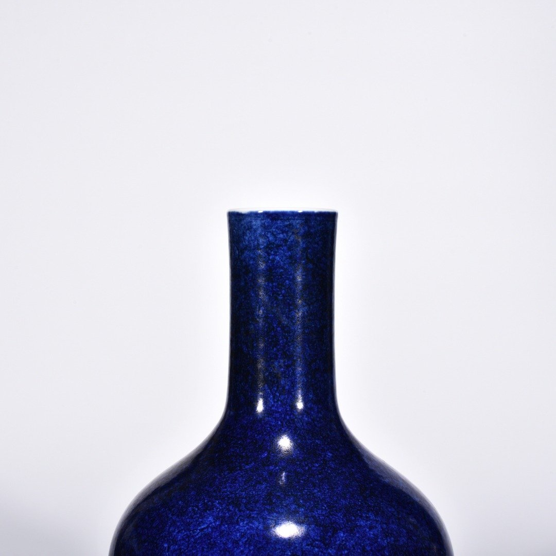 Ming Dynasty Xuande blue-glazed celestial vase with engraved flower pattern