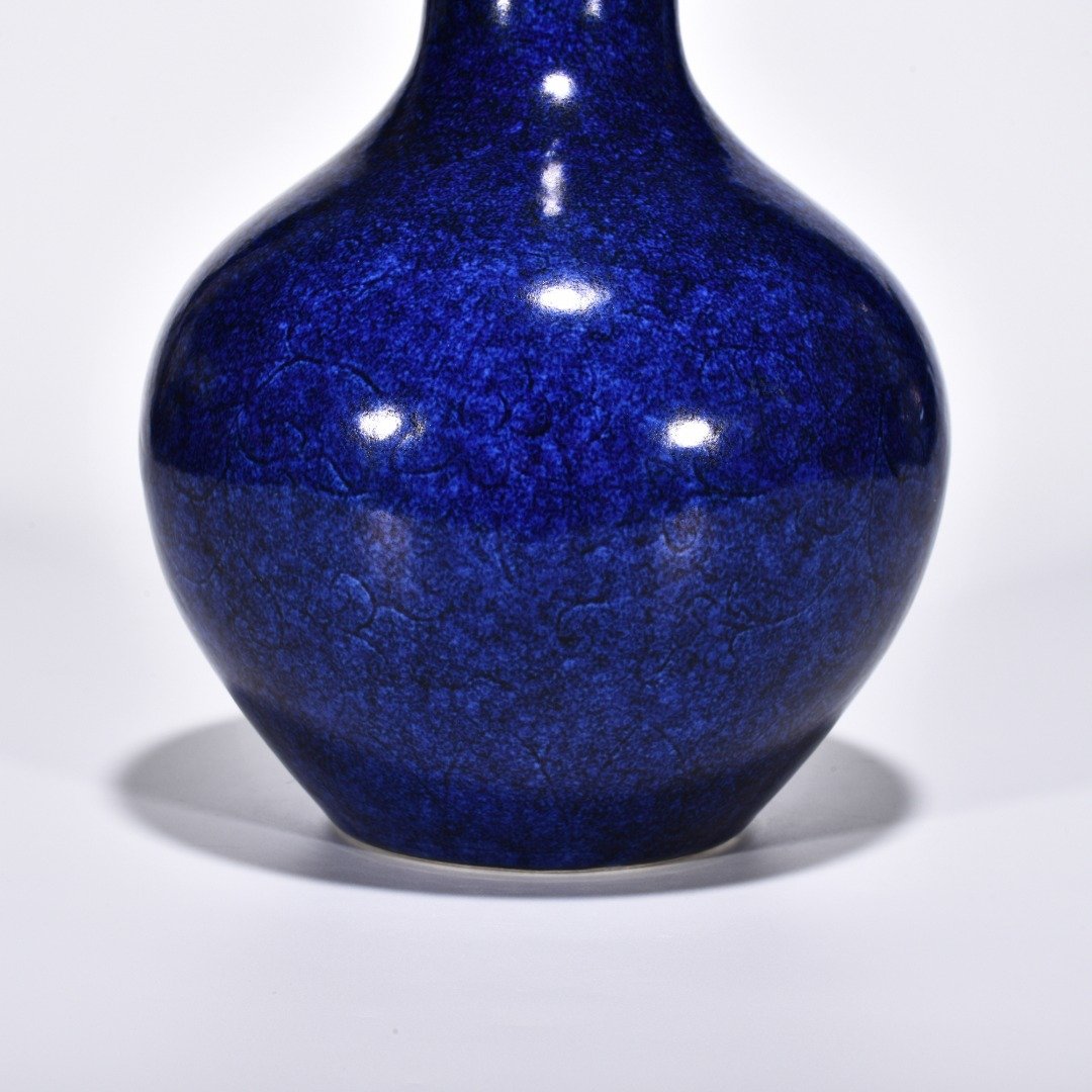 Ming Dynasty Xuande blue-glazed celestial vase with engraved flower pattern
