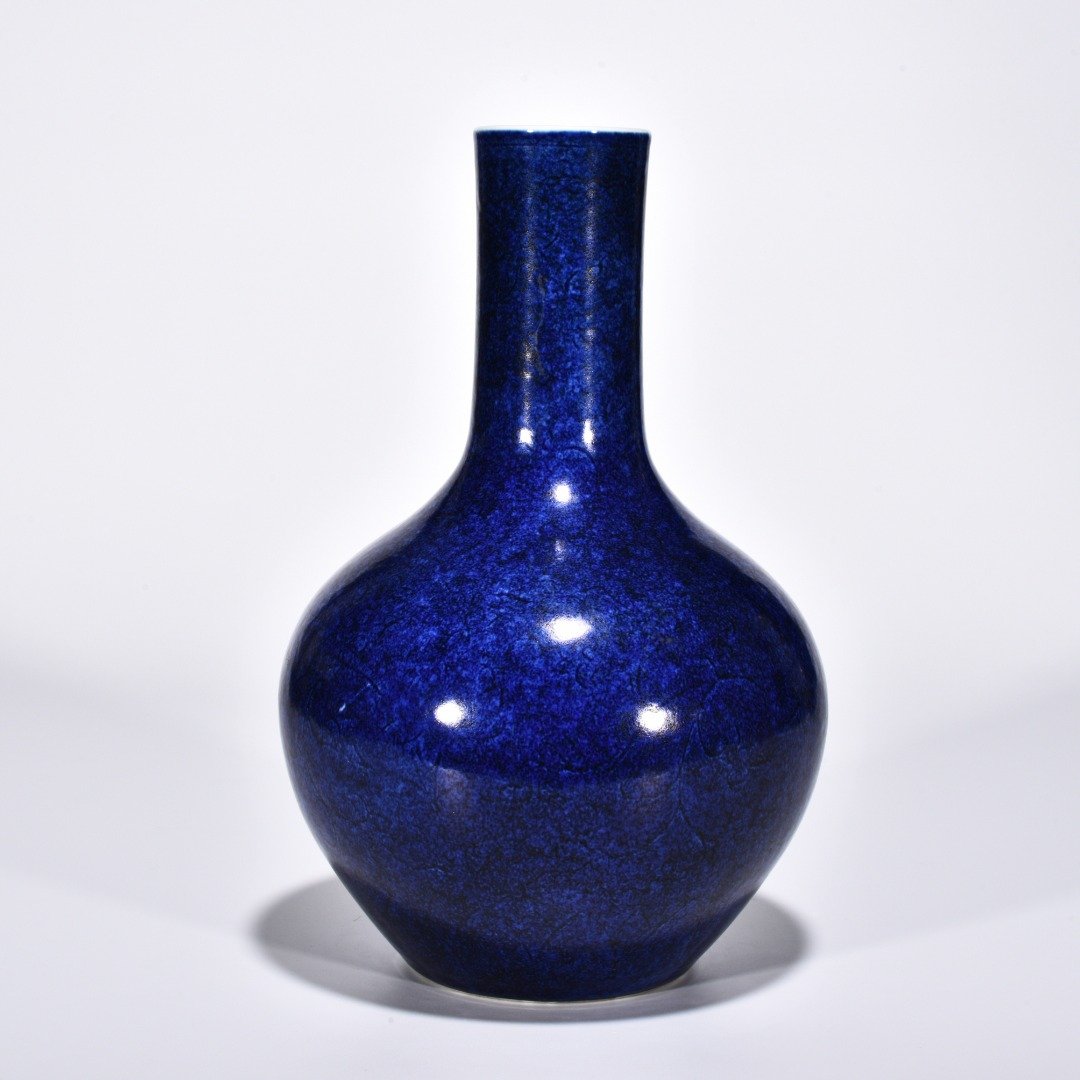 Ming Dynasty Xuande blue-glazed celestial vase with engraved flower pattern