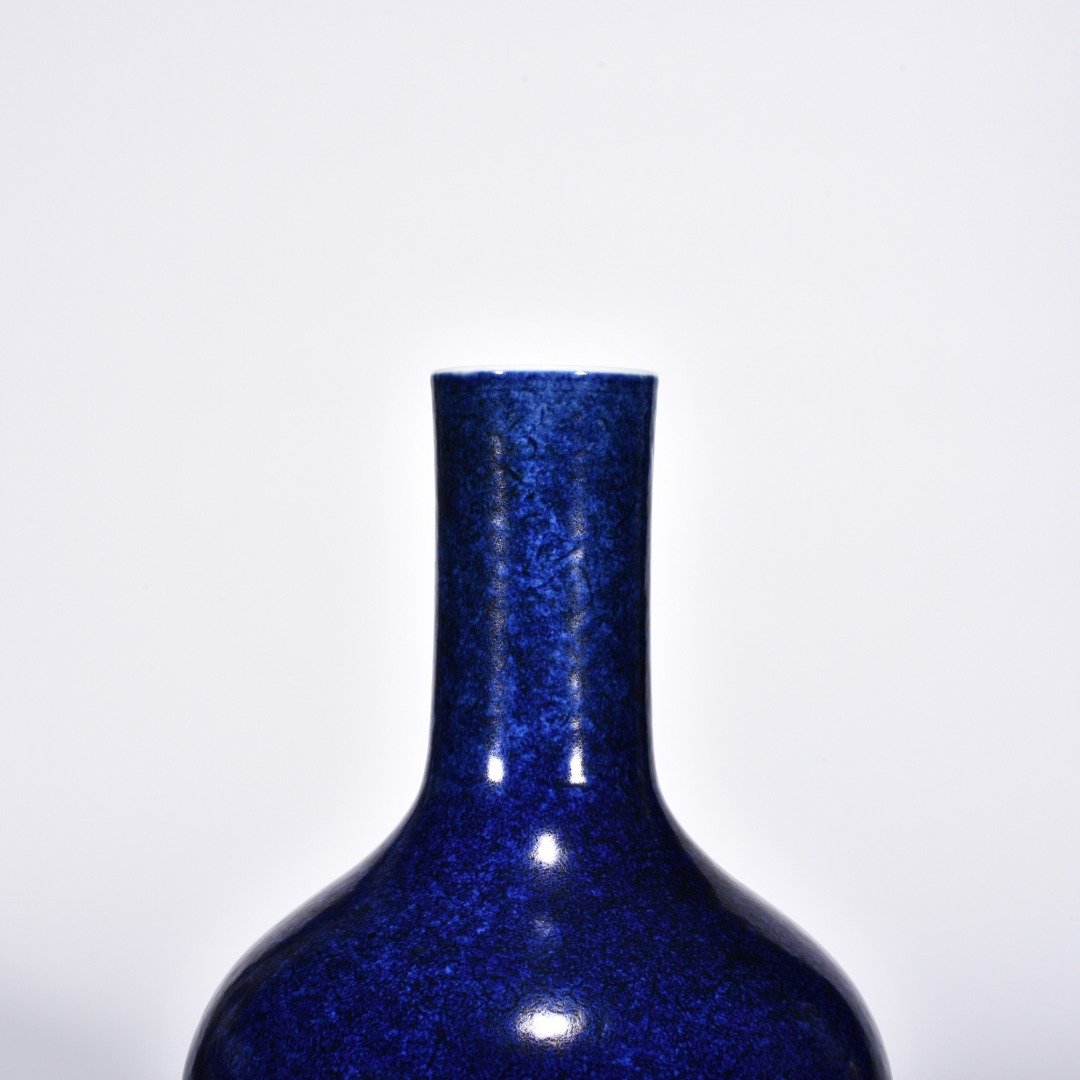 Ming Dynasty Xuande blue-glazed celestial vase with engraved flower pattern