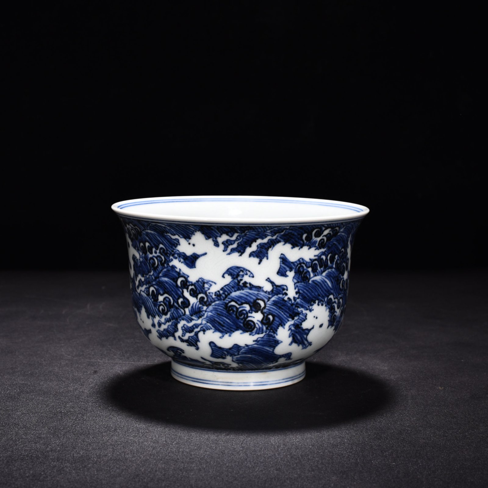 Ming Dynasty Xuande blue and white white seawater five dragon pattern golden bell bowl
