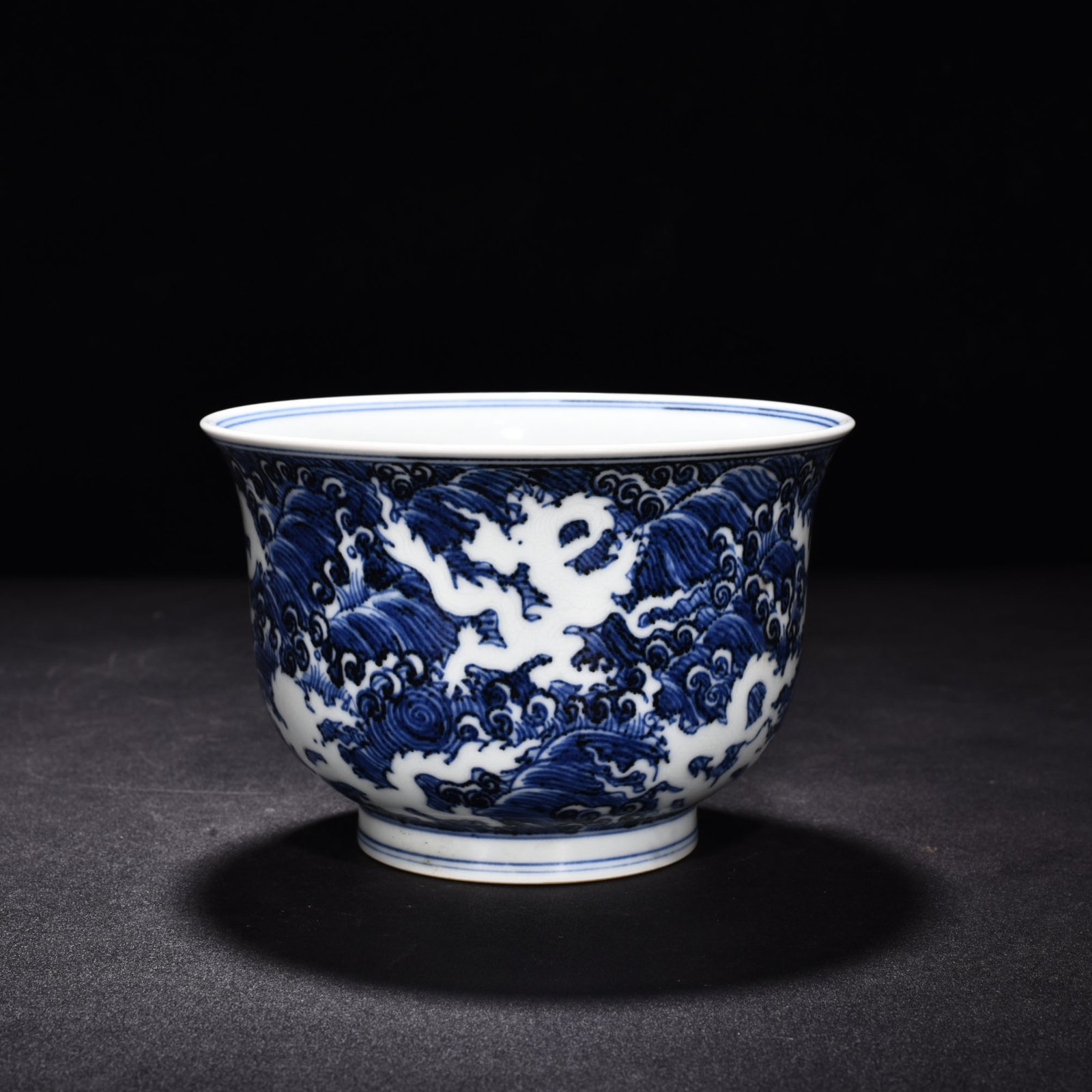 Ming Dynasty Xuande blue and white white seawater five dragon pattern golden bell bowl