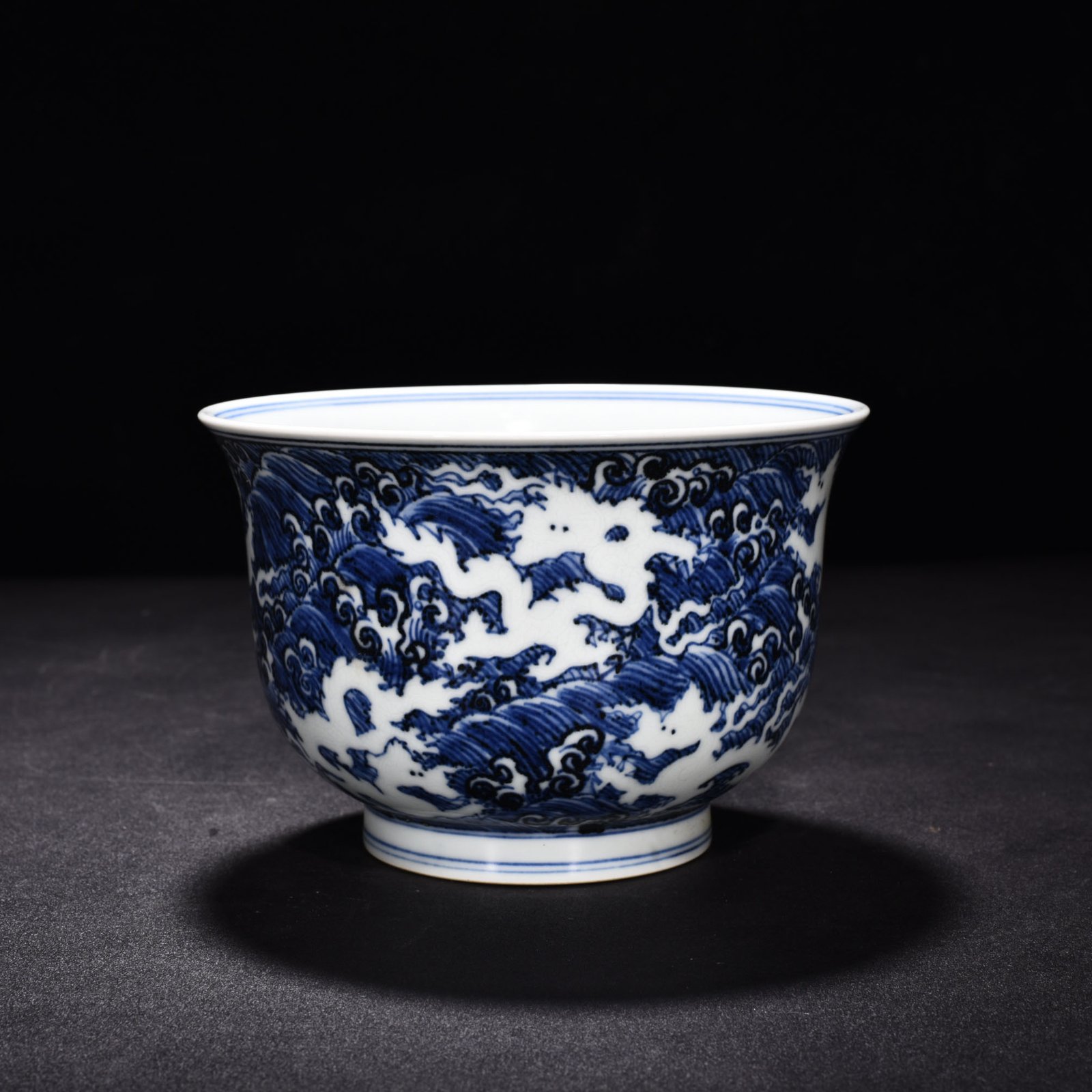 Ming Dynasty Xuande blue and white white seawater five dragon pattern golden bell bowl