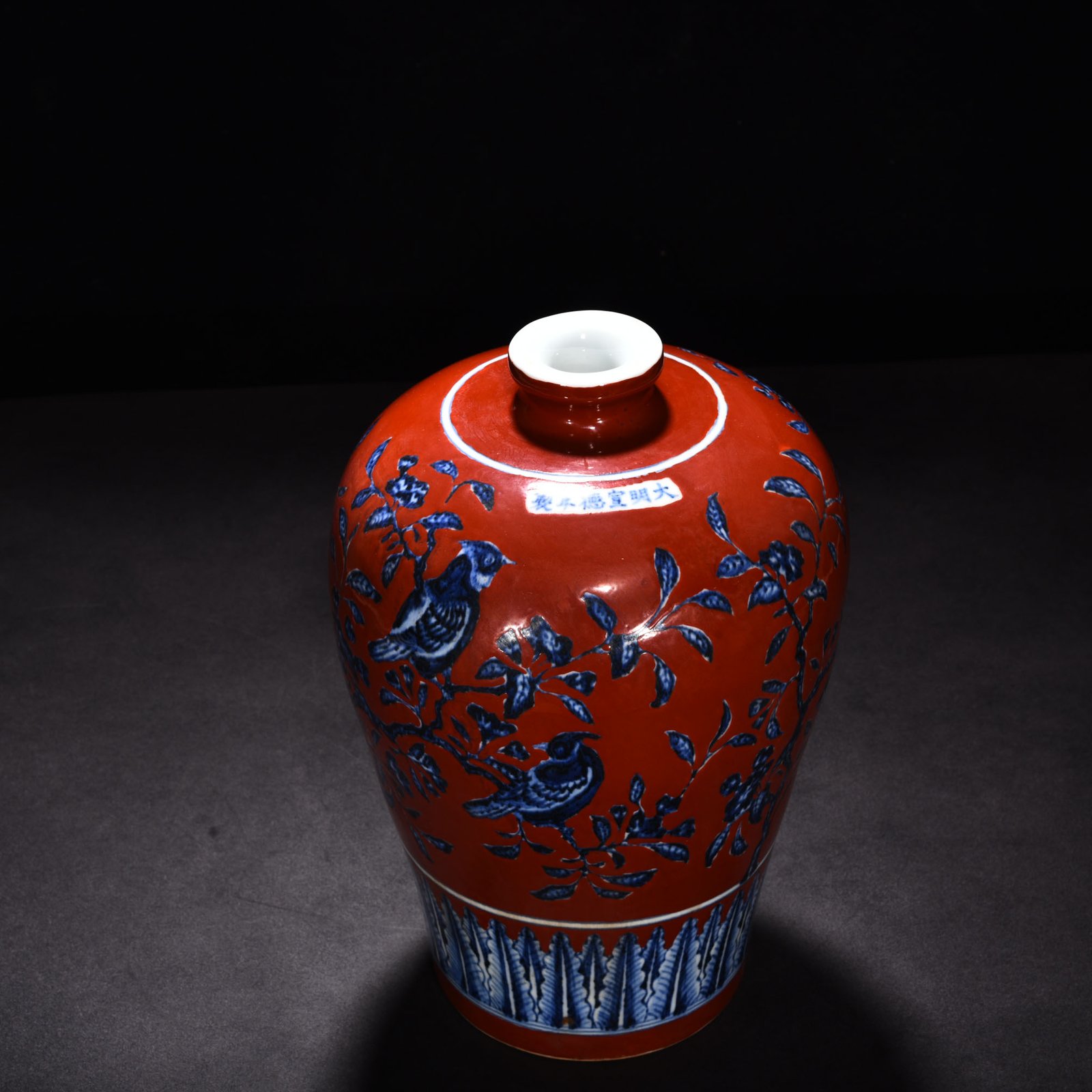 Ming Dynasty Xuande blue and white alum red plum vase with flower and bird