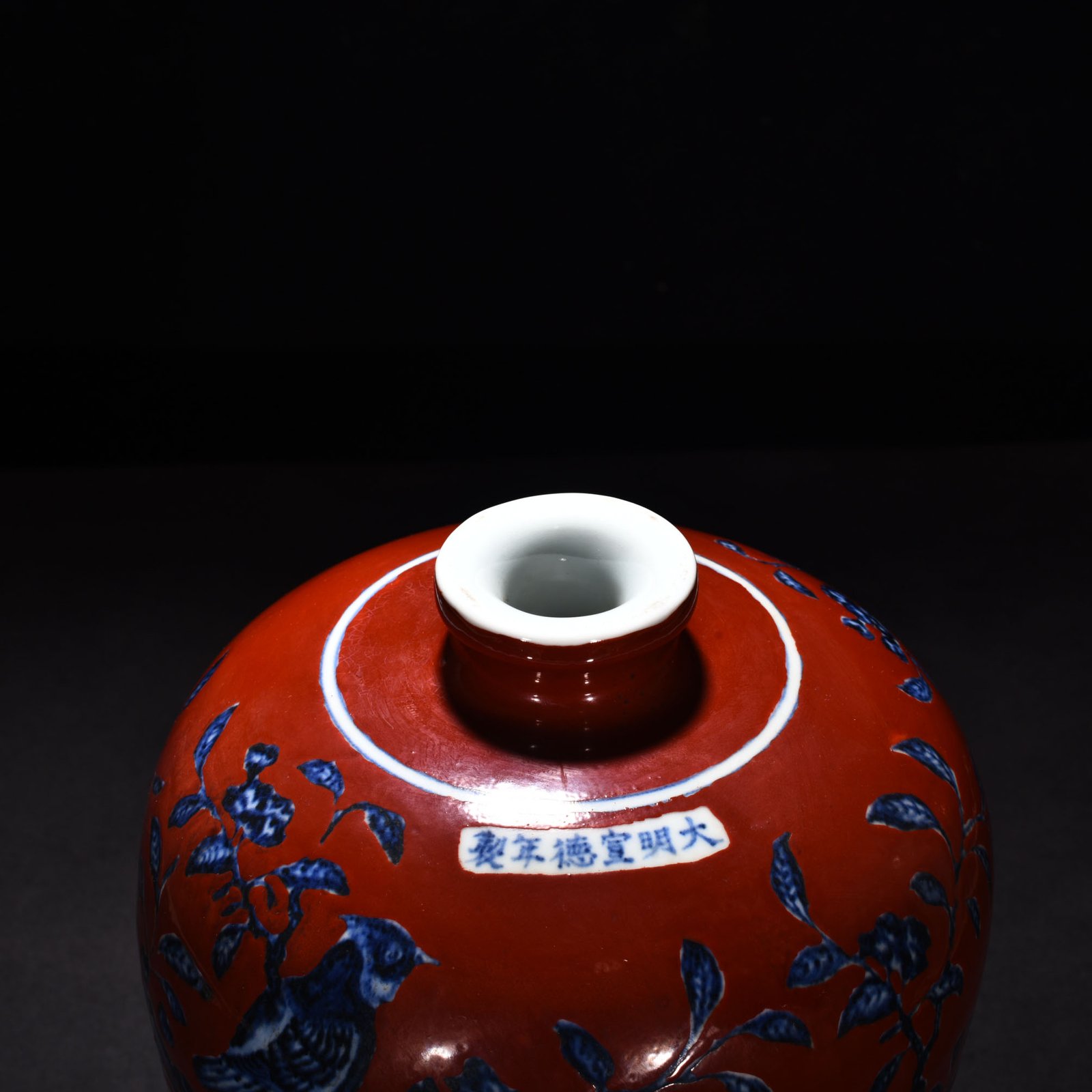 Ming Dynasty Xuande blue and white alum red plum vase with flower and bird