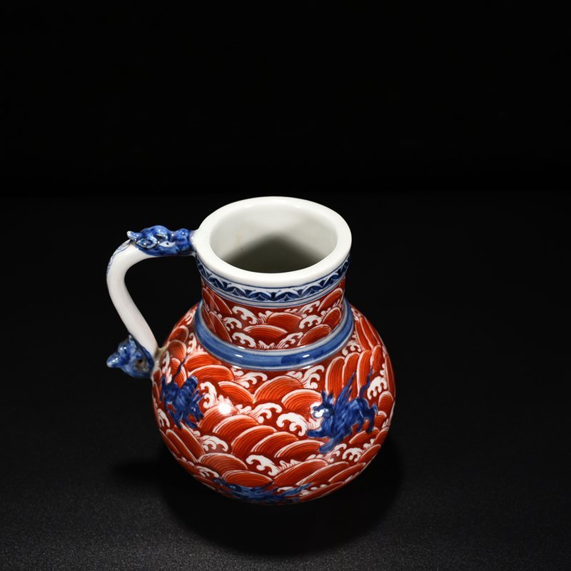 Ming Dynasty Xuande blue and white alum red sea eight monsters and sea animals flower water