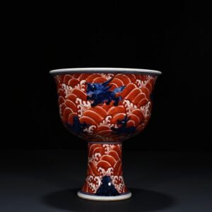 Ming Dynasty Xuande blue and white alum red sea eight monster pattern goblet