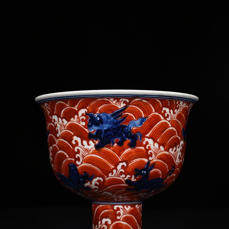 Ming Dynasty Xuande blue and white alum red sea eight monster pattern goblet