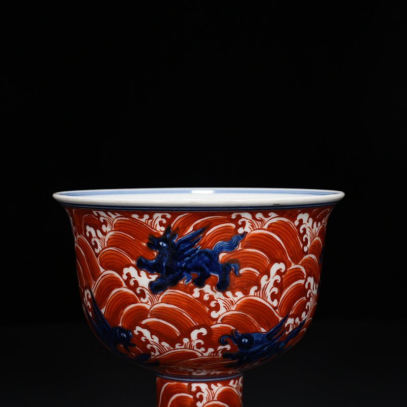 Ming Dynasty Xuande blue and white alum red sea eight monster pattern goblet