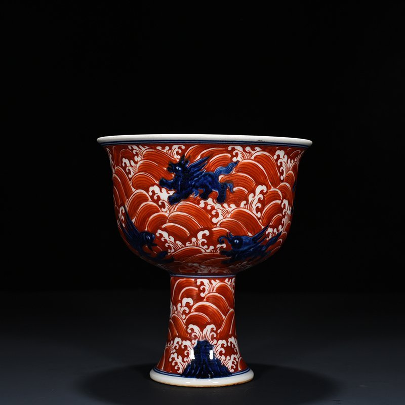 Ming Dynasty Xuande blue and white alum red sea eight monster pattern goblet