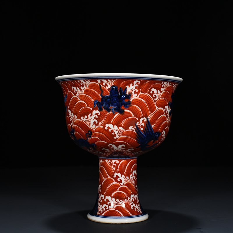 Ming Dynasty Xuande blue and white alum red sea eight monster pattern goblet