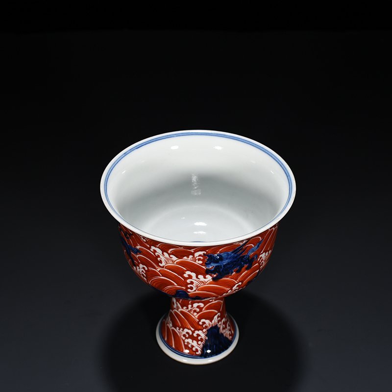 Ming Dynasty Xuande blue and white alum red sea eight monster pattern goblet