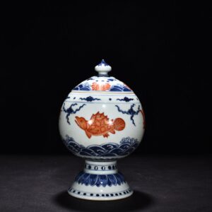 Ming Dynasty Xuande blue and white alum red fish pattern pocket lid jar