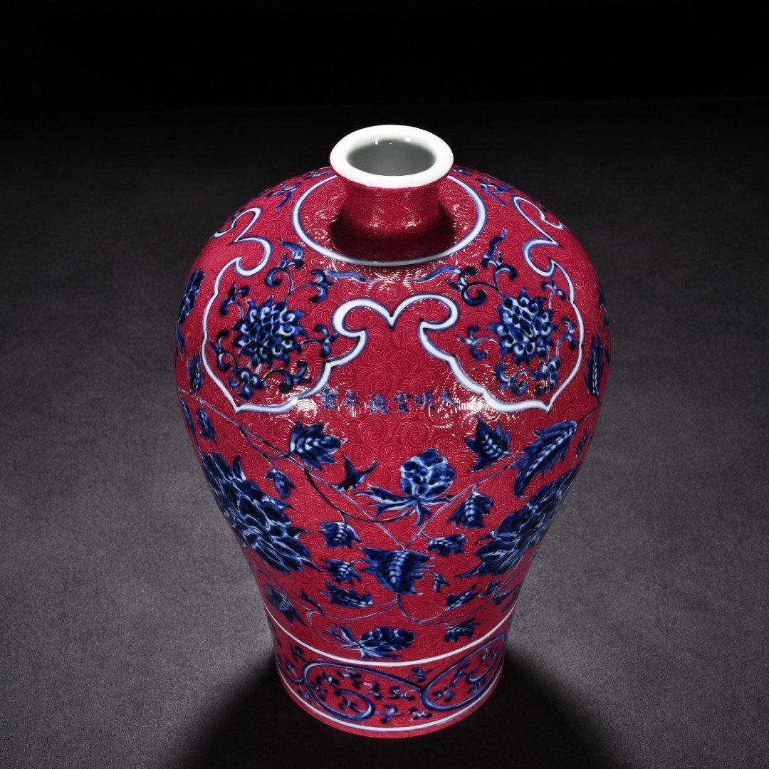 Ming Dynasty Xuande blue and white rouge red rolled flower pattern plum vase