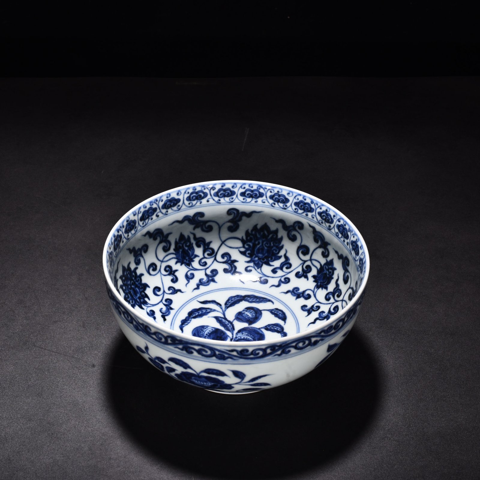 Ming Dynasty Xuande blue and white Arhat bowl with flower and fruit patterns