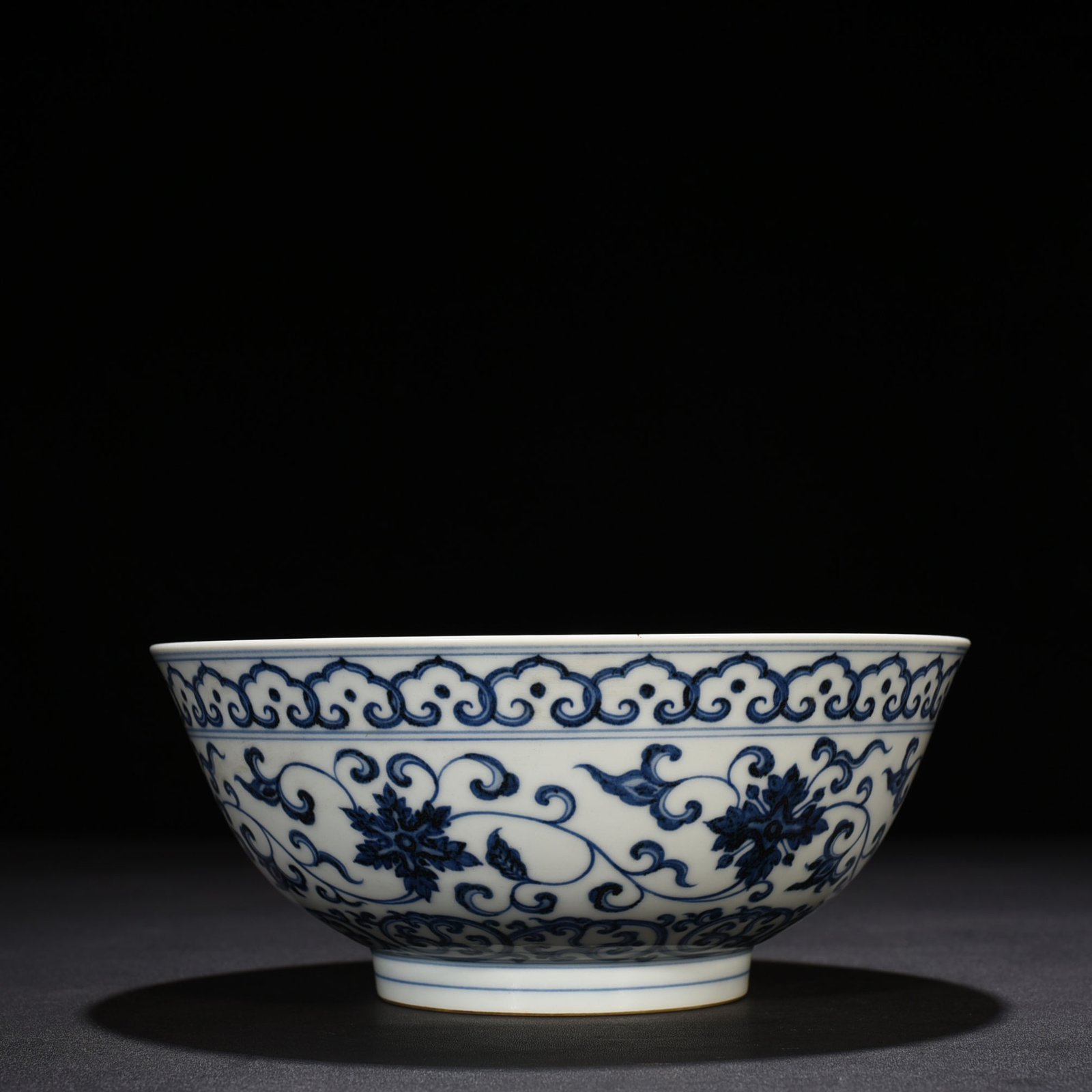 Ming Dynasty Xuande blue and white lotus bowl with Sanskrit holder