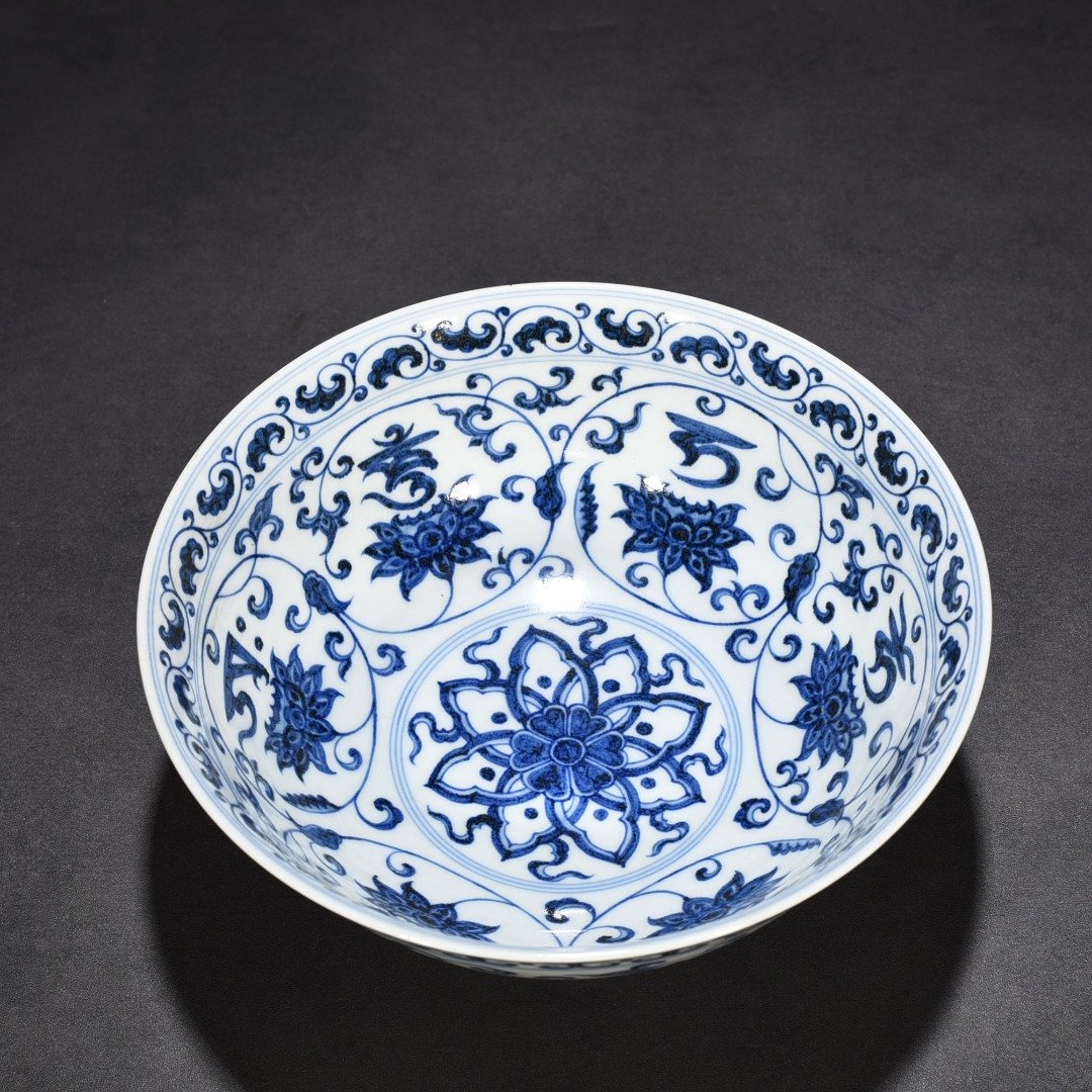 Ming Dynasty Xuande blue and white lotus bowl with Sanskrit holder