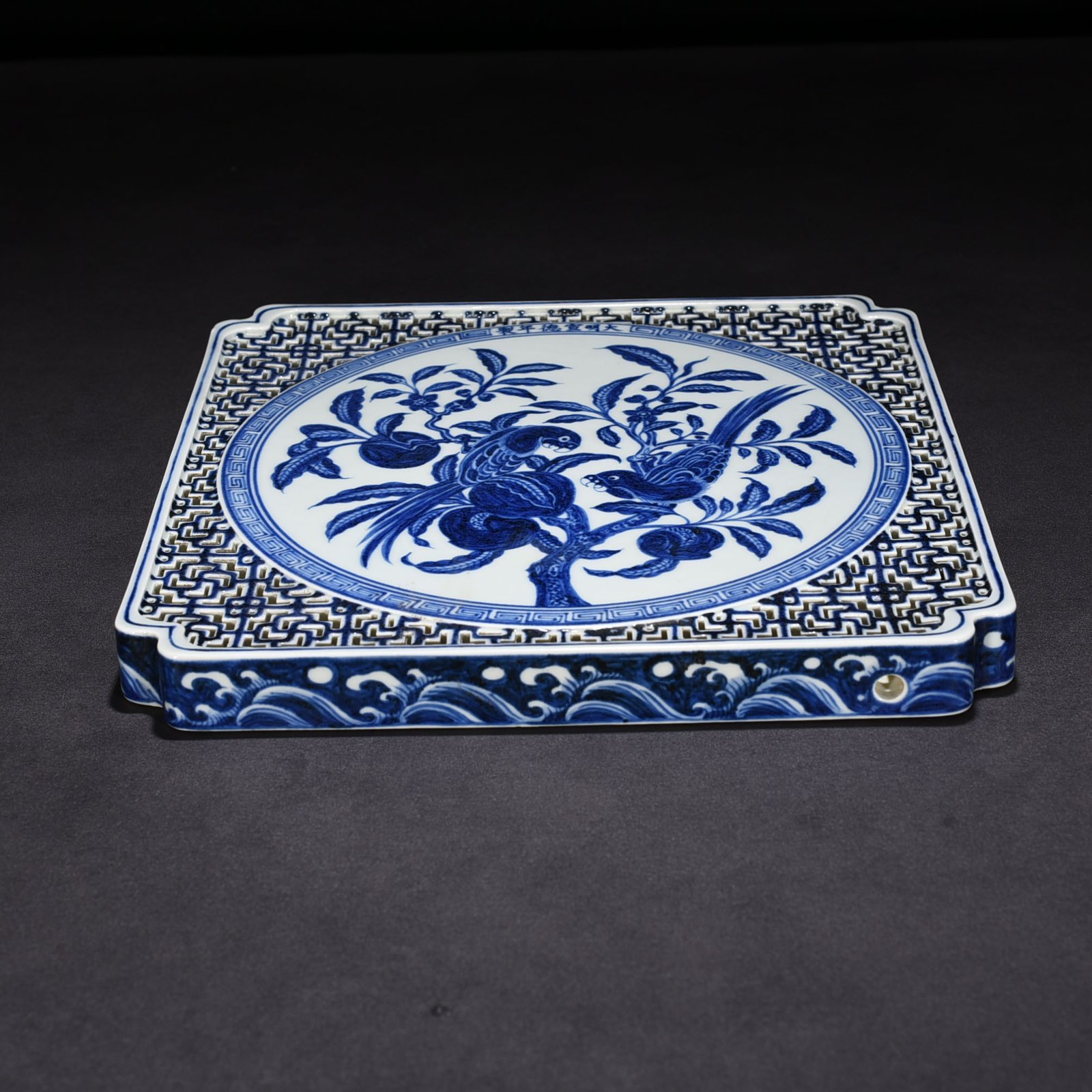 Ming Dynasty Xuande blue and white hollow tea tray with flower and bird patterns