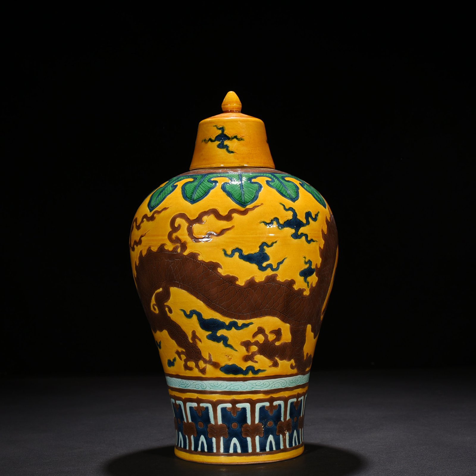 Ming Dynasty Xuande yellow ground plain three-color plum vase with dragon