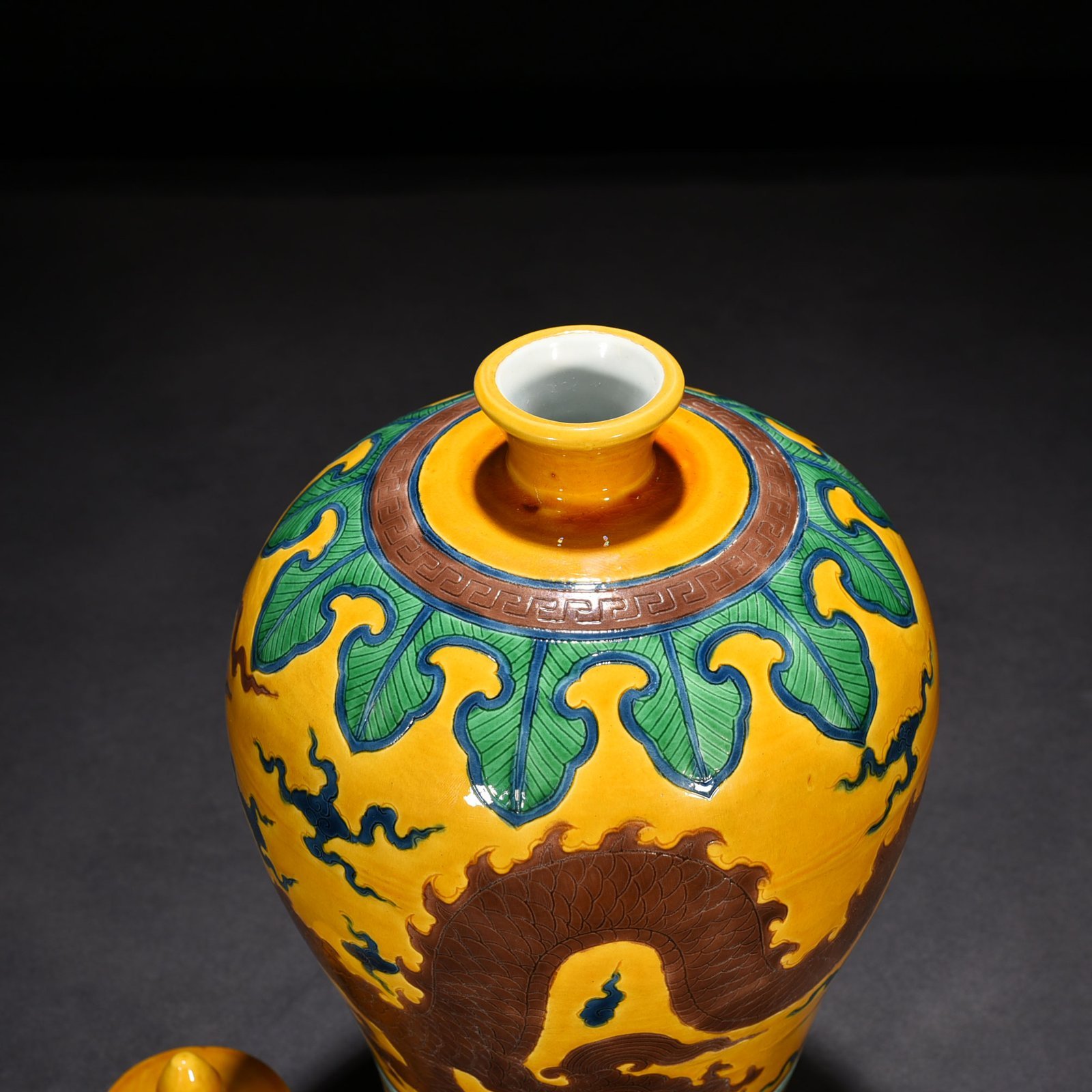 Ming Dynasty Xuande yellow ground plain three-color plum vase with dragon