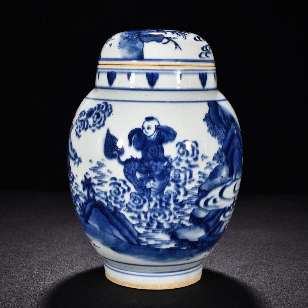 Ming Dynasty Chongzhen blue and white unicorn presenting a child with figure pattern lid jar