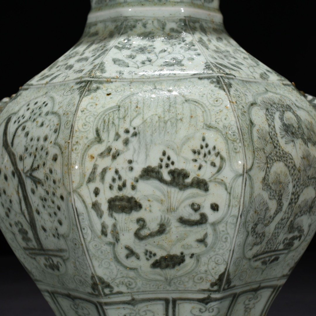 Ming Dynasty Jianwen blue and white pine bamboo and plum pattern animal ear octagonal jar