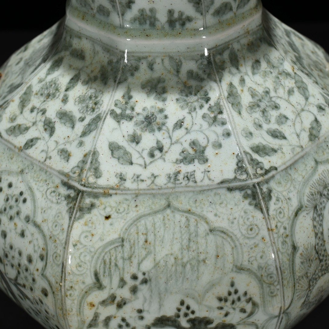 Ming Dynasty Jianwen blue and white pine bamboo and plum pattern animal ear octagonal jar