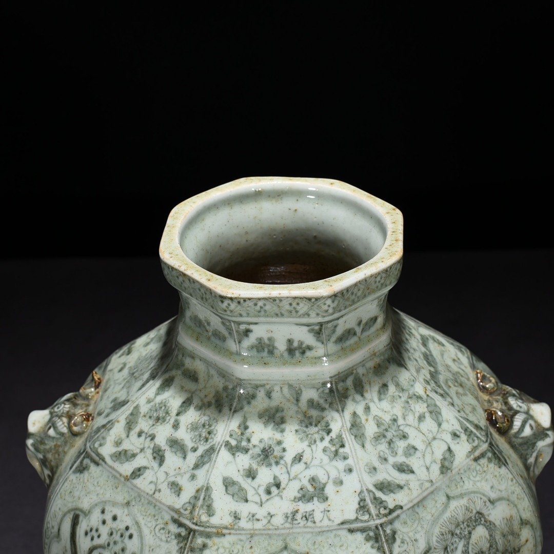 Ming Dynasty Jianwen blue and white pine bamboo and plum pattern animal ear octagonal jar
